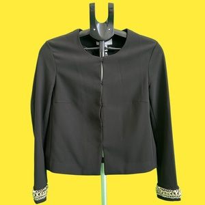 Black cardigan style blazer with metallic gold detail on the cuffs